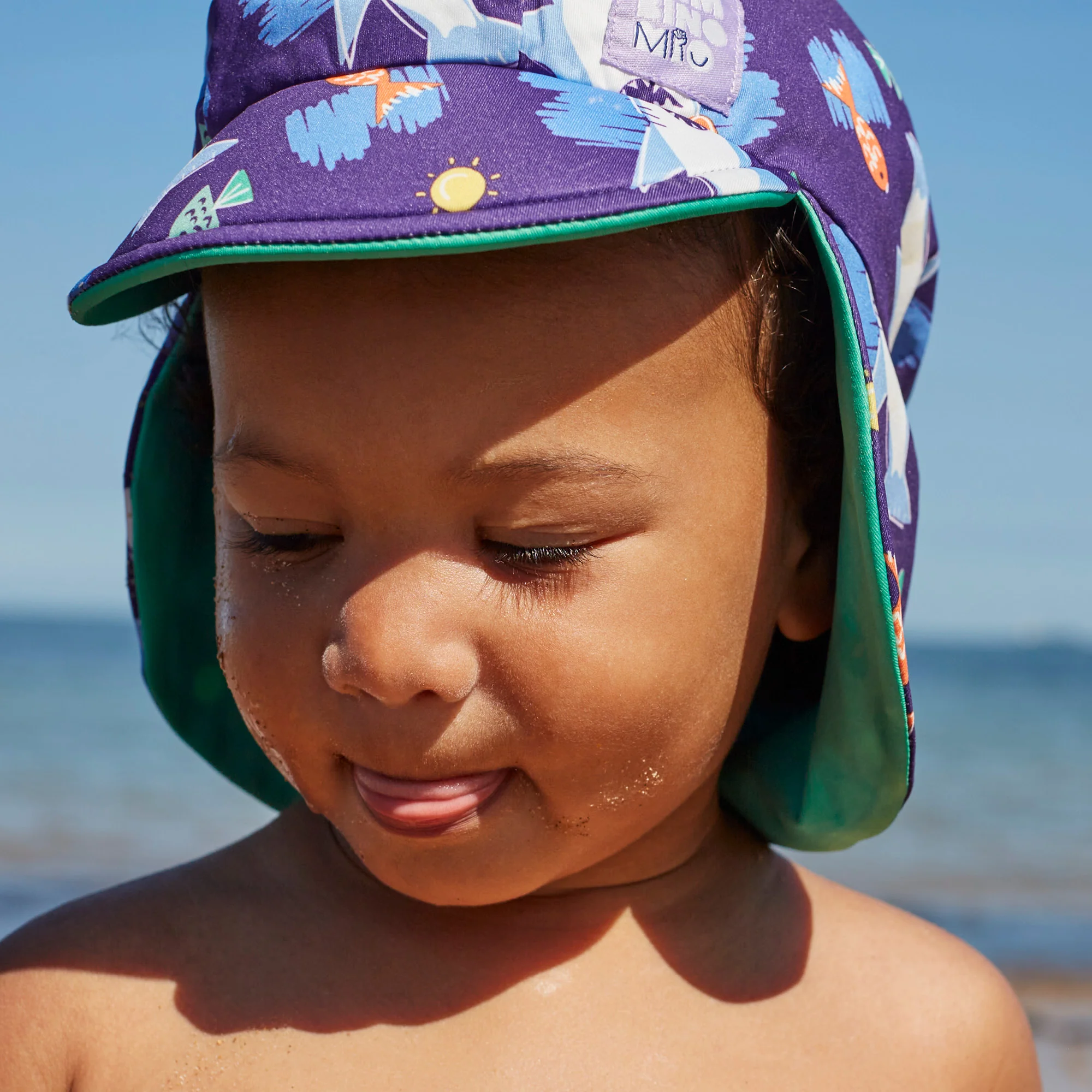UPF 40+ Reversible Swim Hat for Babies in Wave Patrol - Image 5